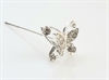 1. stk. Flot dekorations  nål. Sølvfarvet sommerfugl med små glitter sten. Ca. 2 x 1,8 cm