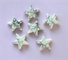 6 stk. små stjerner. klæb dem evt. på på potte, eller som deko. i dekorationer. hvide med sorte striber.