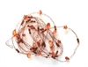 Dekorations kæde kobber farvet. Metal med perler. Meget let. Længde ca.2,40 cm.