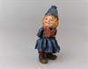 Blå nisse. Pige. Blue Gnome. H. 8 cm. H. 3 cm. Står med hænderne på ryggen.