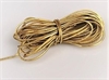 5 meter flot guldfarvet gavebånd m.m. Elastisk. ca. 2mm.