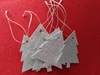 6 stk. sølvfarvede gave mærker. Motiv: juletræ.Højde Ca. 7 cm.