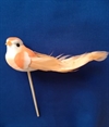 Et stk. dekorations fugl. Orange. På pind. Længde fra næb til halespids Ca. 11 cm x 4 cm.