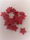 22-24 stk. små flade røde filt stjerner. Ca. 2 cm.