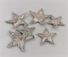 6 stk. bark stjerner med glitter. er i 2 varianter. Ca. 6 og 4 cm.