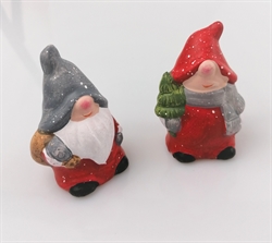 Et stk.  Højde ca. 7 cm. keramik julenisse eller julemand med snefnug. Prisen er pr. stk. sendes ass.