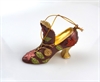 Flot dekorations sko evt. til ophængning på gren, juletræ eller i dekorationer. Ca. 7,5 cm.  H ca. 6 cm.
