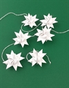 6 stk. Hvide flettede stjerner. Ø ca. 4 cm.