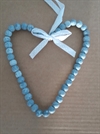 Et stk. dekorations hjerte .Meleret træ perler. Til evt. ophængning. Ca.16 cm