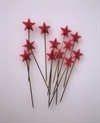 10 til 12 stk. Stjerne nåle. Rød. L. ca. 5,5 cm. Pynt i dekorationer m.m.