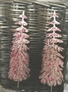 2 stk. Juletræer i hvid plast med rødt glitter. Højde ca. 14 cm.