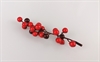 Lille dekorations gren med kunstige bær. Længde ca. 10 cm.