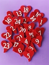 Kalendertal. Røde hjerter. Filt. Med hvide filt tal. 1 til 24. Hjerterne måler Ca.5 cm