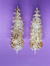2 stk. Juletræer i hvid plast med guld glitter. Højde ca. 14 cm.